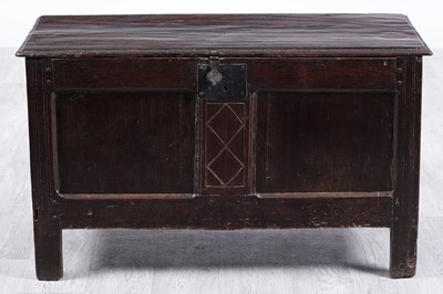 Lot 95 - An 18th Century carved oak coffer