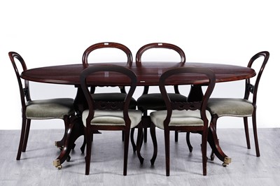 Lot 41 - Unicorn Man mahogany dining table; and six balloon back dining chairs