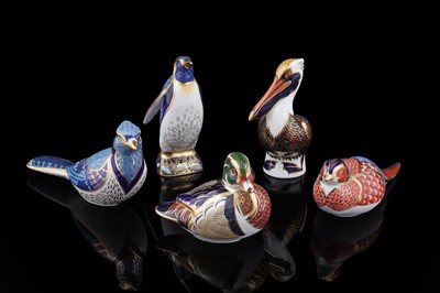Lot 318 - A collection of five Royal Crown Derby paperweights