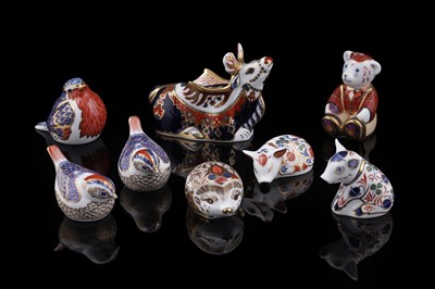 Lot 321 - A collection of eight Royal Crown Derby paperweights