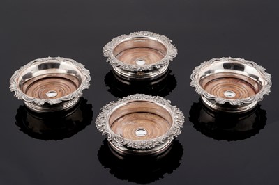 Lot 399 - Two pairs of late 19th Century Old Sheffield plate wine coasters