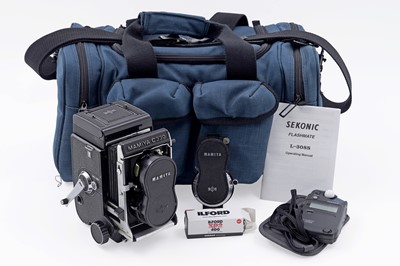 Lot 753 - Mamiya C330 Professional F Twin Reflex film camera; lenses; and a bag