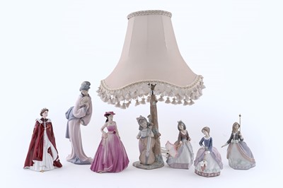 Lot 373 - A collection of seven Lladró, Nao and other ceramic figures