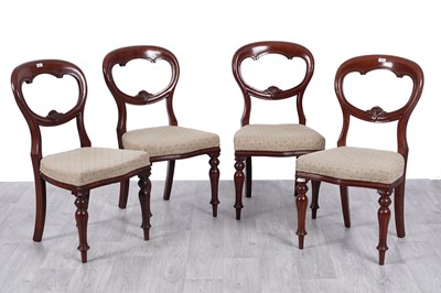 Lot 22 - A set of four Victorian mahogany balloon back dining chairs