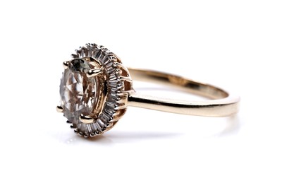 Lot 61 - A diaspore (turkizite) and diamond cluster ring