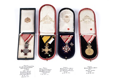 Lot 647 - Four cased Austrian medals
