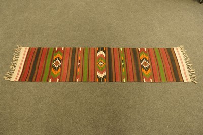 Lot 180 - A Kilim rug; and two others