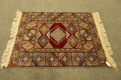Lot 184 - An Afghan silk and wool rug