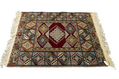 Lot 184 - An Afghan silk and wool rug