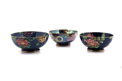 Lot 348 - A collection of three Maling lustre bowls