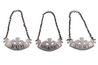 Lot 271 - A set of three George III silver wine labels