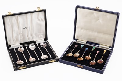 Lot 108 - A set of six modern silver spoons; and a set of six silver gilt and enamel coffee spoons