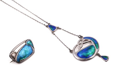 Lot 54 - An Edwardian Art Nouveau silver and enamel pendant; and similar brooch