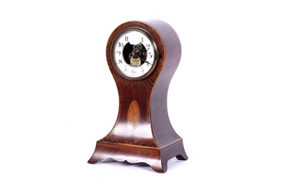 Lot 536 - Eureka Clock Co Ltd, London: an Edwardian inlaid mahogany electric balloon mantle clock