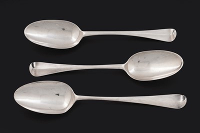 Lot 490 - A George III silver fancy-back tablespoon; and a pair of silver fancy back tablespoons