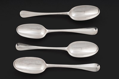 Lot 511 - A pair of George I silver Hanoverian pattern tablespoons; and two others