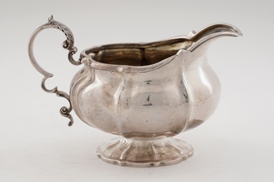Lot 89 - A Victorian silver teapot; and other tea ware