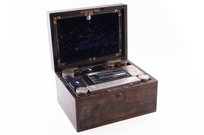 Lot 392 - A Victorian rosewood toilet box