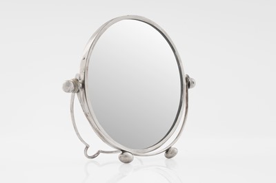 Lot 11 - A George V silver mounted circular toilet mirror