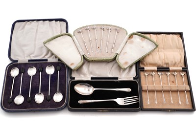 Lot 232 - A set of six George V silver cocktail sticks; and