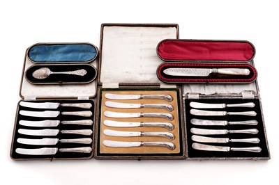 Lot 233 - Three cased set of six silver-handled tea knives; and a late Victorian silver cake knife
