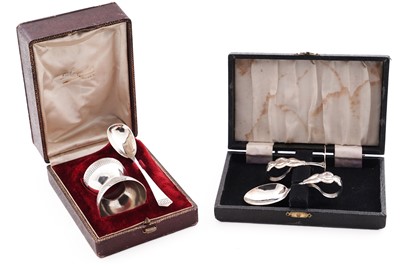 Lot 329 - A George V silver novelty, childs pusher and spoon; and a cased French silver egg-cup and spoon