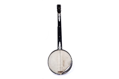 Lot 61 - A seven-string banjo