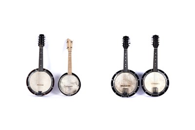 Lot 442 - Three mandolin banjos; and a ukulele banjo