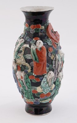 Lot 319 - A Chinese famille noir biscuit vase