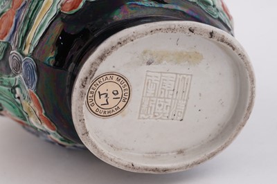 Lot 319 - A Chinese famille noir biscuit vase