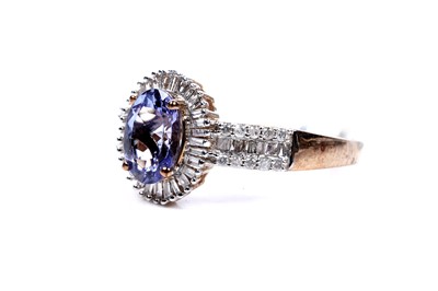 Lot 13 - A tanzanite and diamond cluster ring