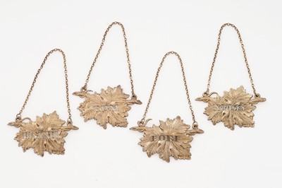 Lot 270 - A set of Elizabeth II silver-gilt wine labels