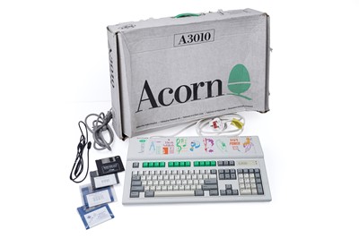 Lot 787 - A boxed Acorn A3010 computer with power leads and discs