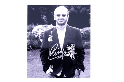 Lot 213 - The Beatles: Ringo Starr autographed photograph