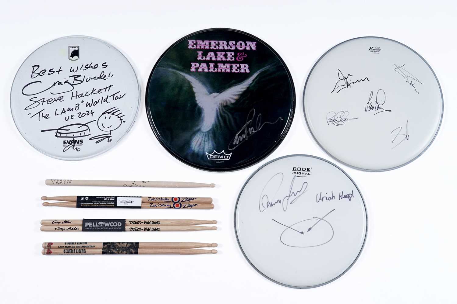 Lot 468 - A selection of signed drum heads and sticks