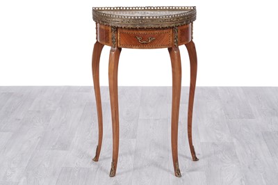 Lot 20 - A Louis XV style marble topped kingwood and walnut ormolu banded demilune side table