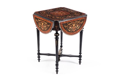 Lot 553 - A French ebonised and amboyna ormolu mounted occasional table