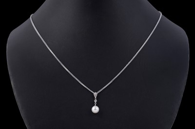 Lot 39 - A contemporary Art Deco style cultured pearl and diamond pendant on chain