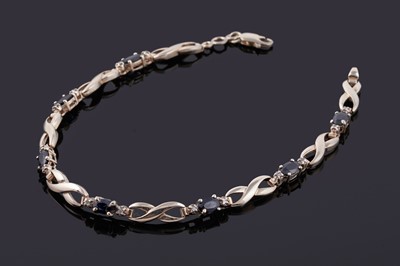Lot 98 - A contemporary sapphire and diamond bracelet