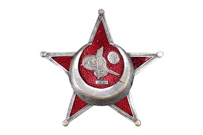 Lot 623 - A First World War Iron Half Moon