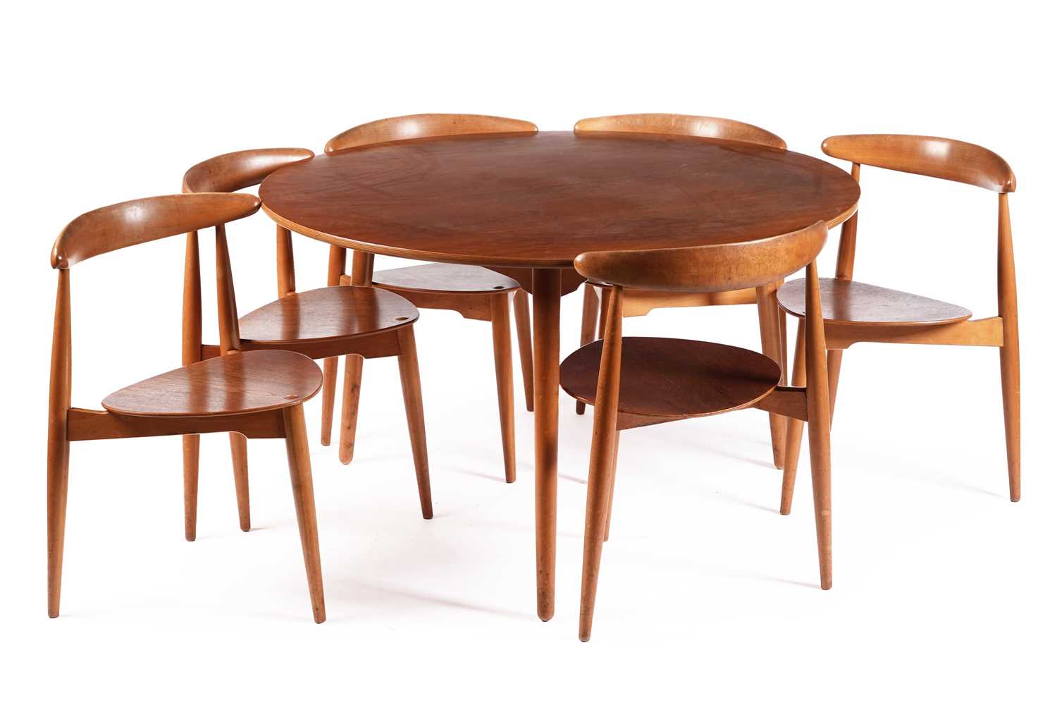 Lot 5 - Hans Wegner for Fritz Hansen: a circular teak and beech dining table and chairs