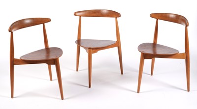 Lot 5 - Hans Wegner for Fritz Hansen: a circular teak and beech dining table and chairs