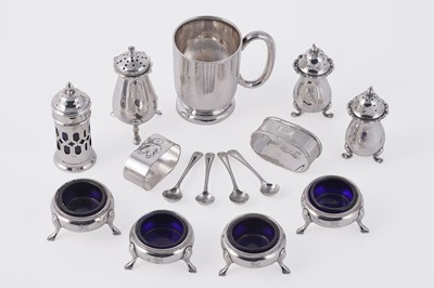 Lot 277 - A set of four Victorian silver salts; pepperettes; napkin rings; and a cup