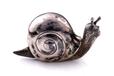 Lot 692 - An Elizabeth II cast silver novelty tape measure