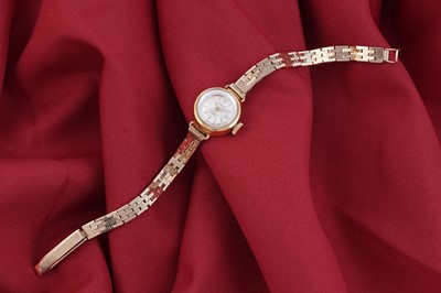 Lot 261 - A lady's 18ct gold cased Iaxa wristwatch with 9ct gold bracelet strap