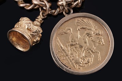 Lot 38 - An early 20th Century 9ct gold charm bracelet