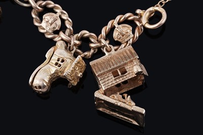 Lot 38 - An early 20th Century 9ct gold charm bracelet