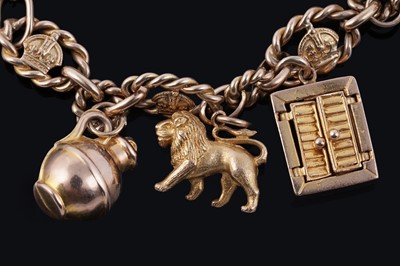 Lot 38 - An early 20th Century 9ct gold charm bracelet