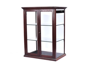 Lot 745 - An Edwardian glazed mahogany shop display cabinet