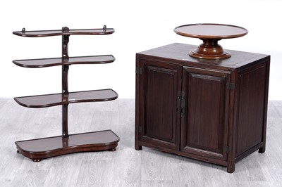 Lot 36 - A Georgian style mahogany lazy susan; a waterfall bookshelf; and a cabinet